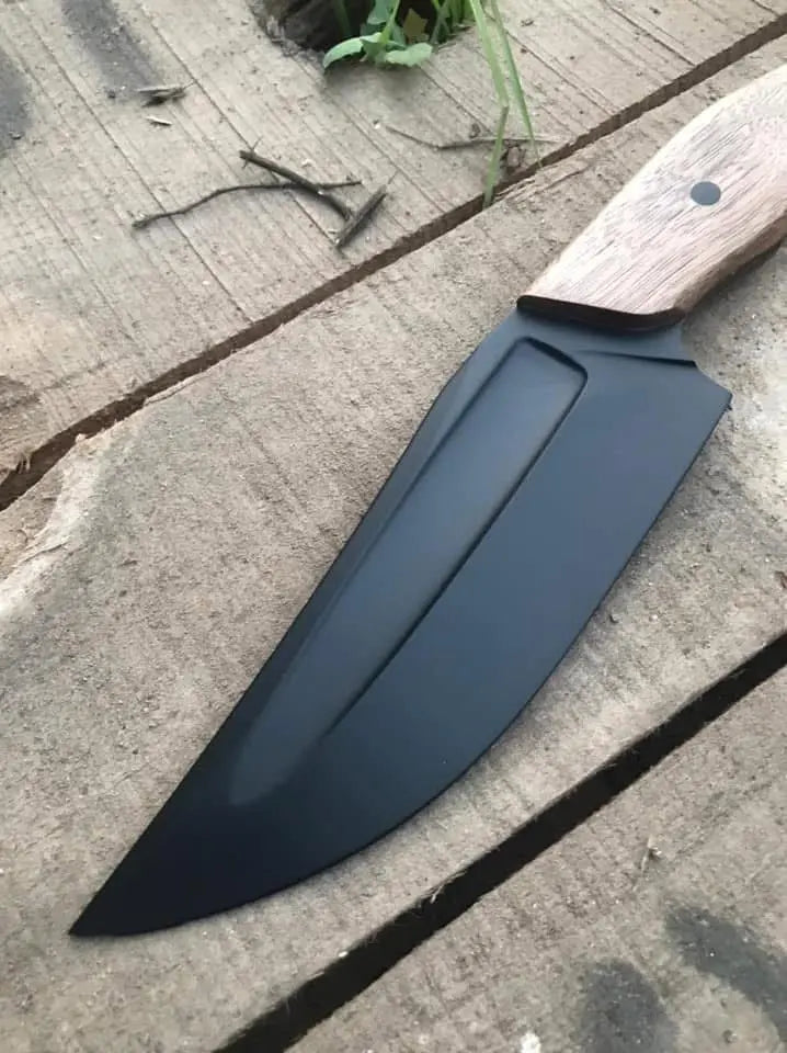 Black blade hunting knife with leather sheath and lacing