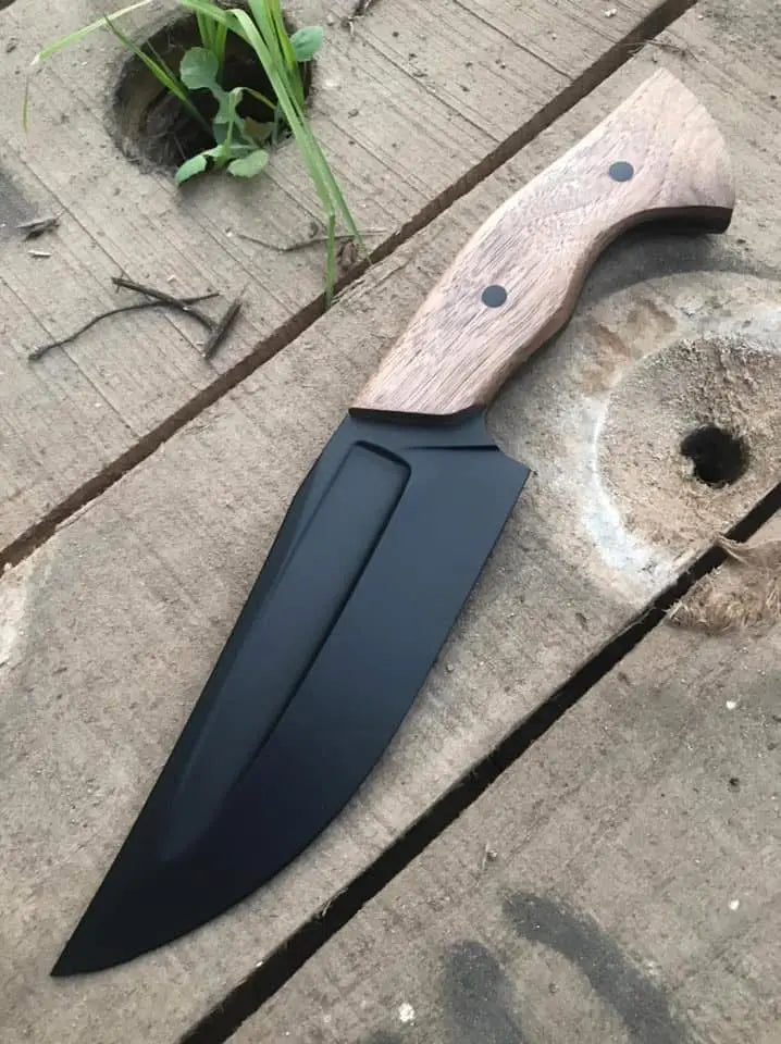 Black blade hunting knife with walnut handle - side angle