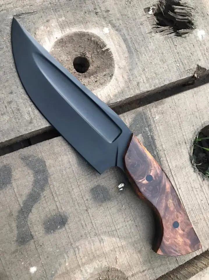 Burl wood handle grain detail on black powder coat knife