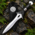 Handmade black Viking style carbon steel knife with mirror polished dagger blade, black handle, Celtic collar and black leather sheath with triquetra emblem