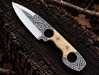 White bone handle scales with screws and engraved finger hole ring detail