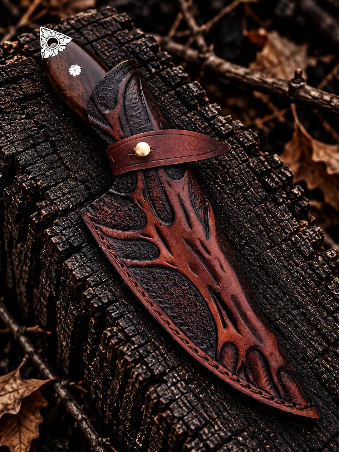 Rosewood handle with steel pins and engraved steel pommel cap detail