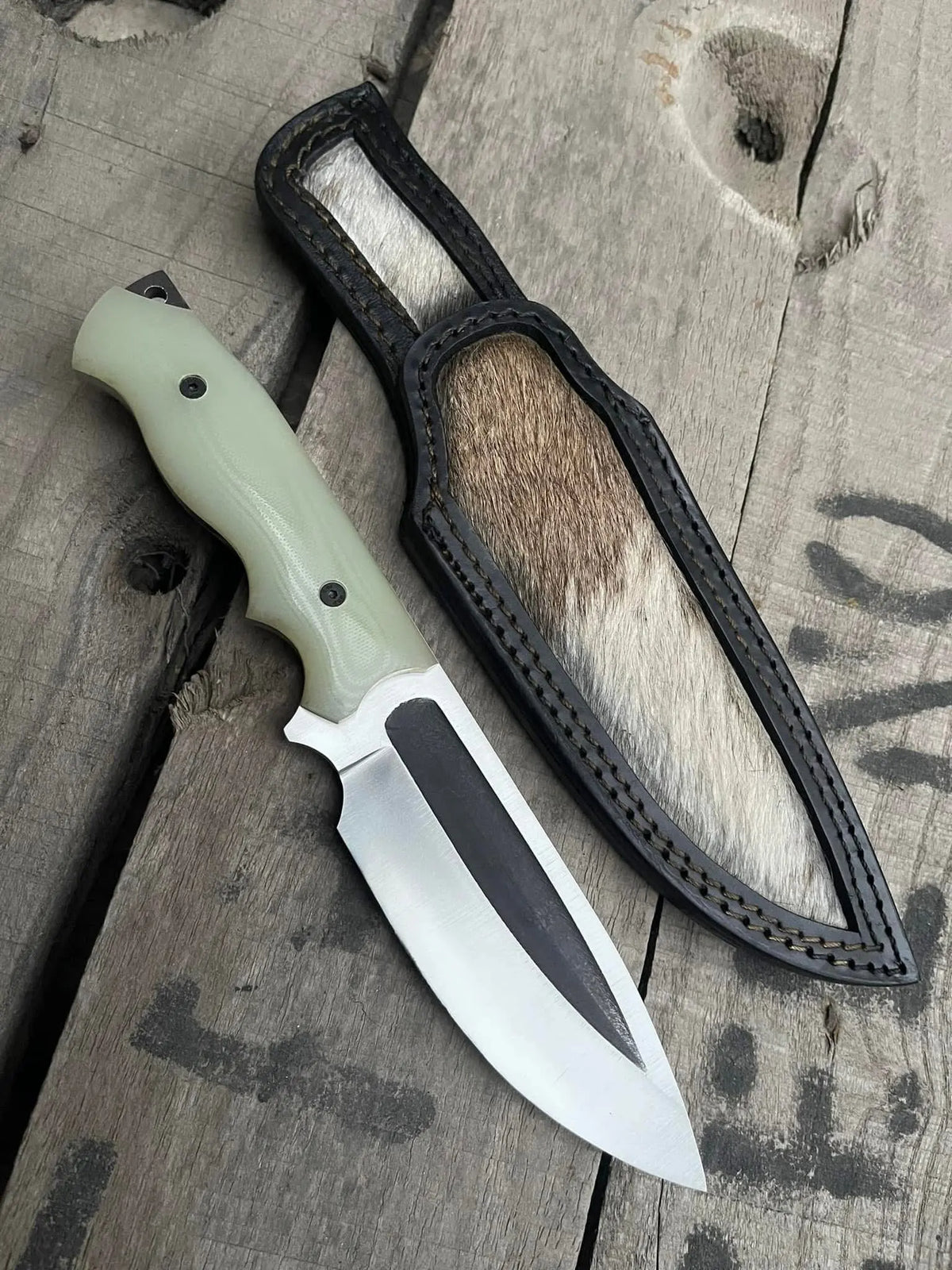 Handmade D2 steel full tang cowboy knife with green G10 handle and hair-on cowhide sheath - full view