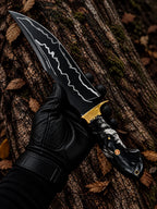 Handmade D2 steel hunting knife with black blade, brass guard and buffalo horn handle - full view