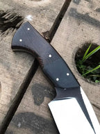 D2 steel blade close-up on black handle hunting knife