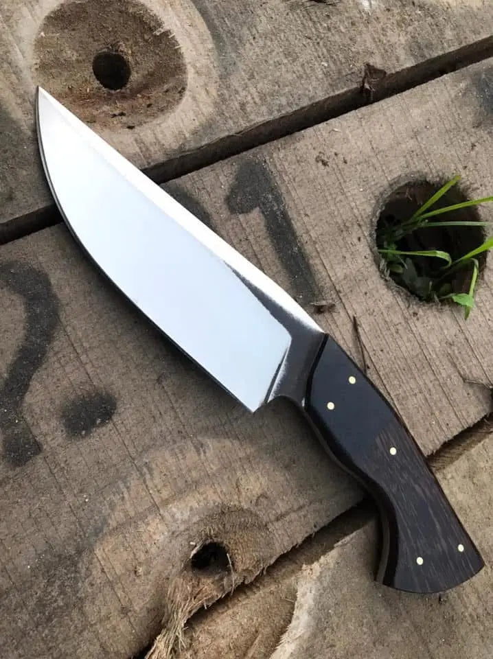 Black handle detail with contrast pins on D2 steel knife