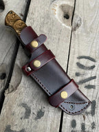 Brown and golden swirl resin handle with brass pins detail