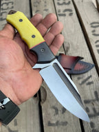 Yellow G10 handle with black micarta bolster and screws detail