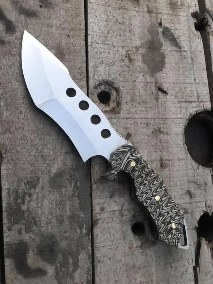 D2 steel mirror polished blade with lightening holes close-up