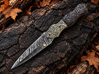 Damascus folding knife with brass liners and easy lock - angle 3