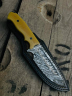 Yellow G10 handle scales with screws detail on Damascus knife