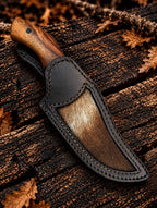Damascus finger hole knife with Italian leather hair-on cowhide sheath - angle 4