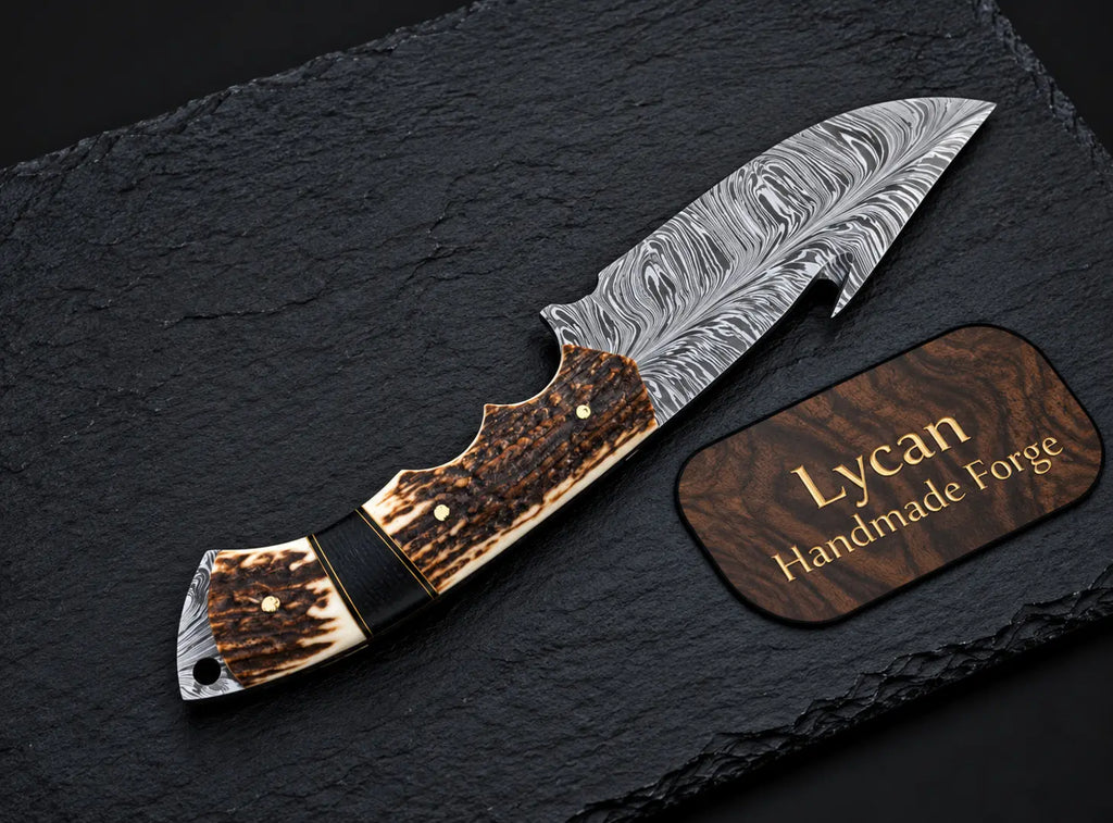 Feather Damascus blade pattern close-up on gut hook skinner knife