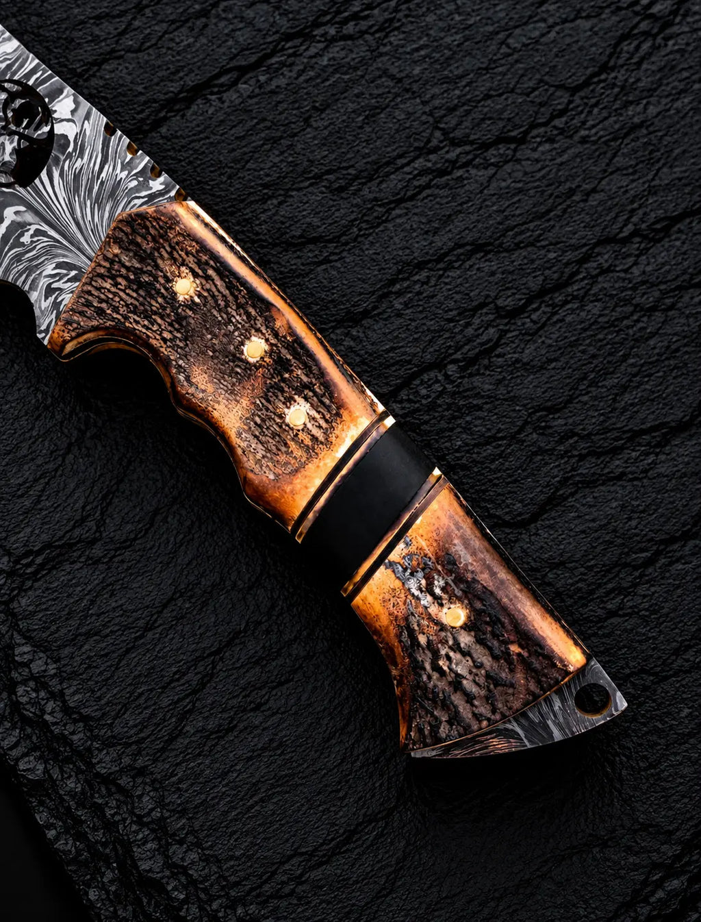Stag horn handle with black micarta spacer and brass accent detail