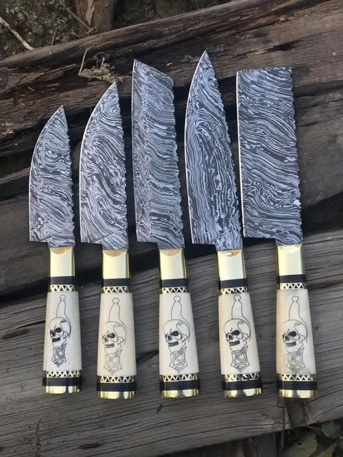 Damascus steel blade pattern close-up on 5-piece knife set