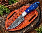 Raindrop Damascus pattern close-up on skinner knife blade