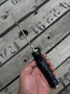 Black woven texture wrapped handle detail on dagger knife