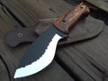 Handmade hammered black hunting knife with wood handle and leather sheath - full view