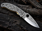 Engraved folding knife with genuine leather sheath