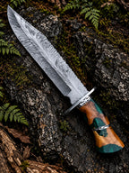 Handmade Damascus feather bowie knife with feather pattern blade, filework steel guard and green resin and wood handle
