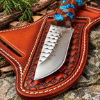 File-worked spine detail on mirror polished skinner knife blade