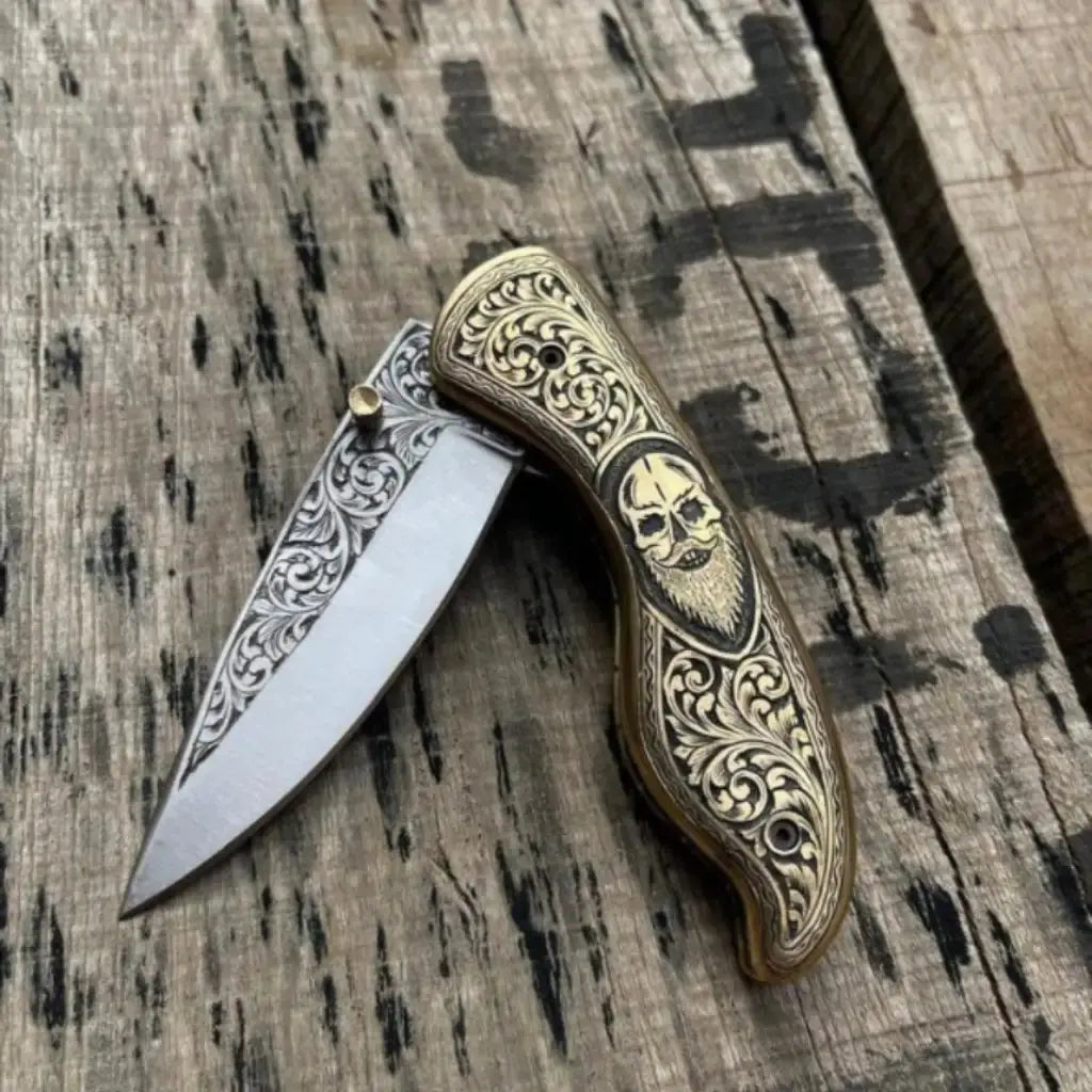 Skull handle folding pocket knife - full length view